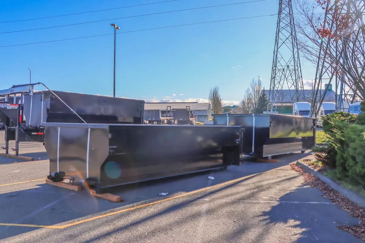 Roll-off dumpster ready for waste disposal at job site for Construction Dumpster Rental in Dumfries